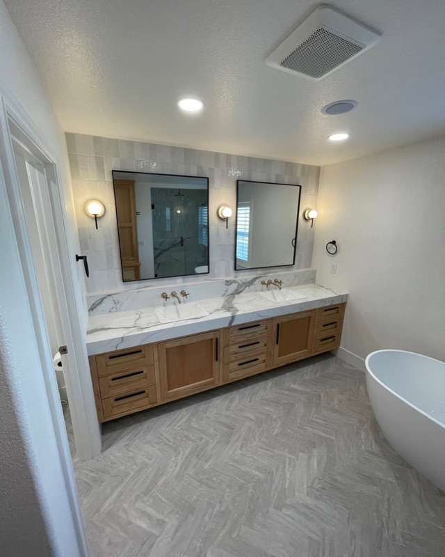Custom white oak double vanity with marble top